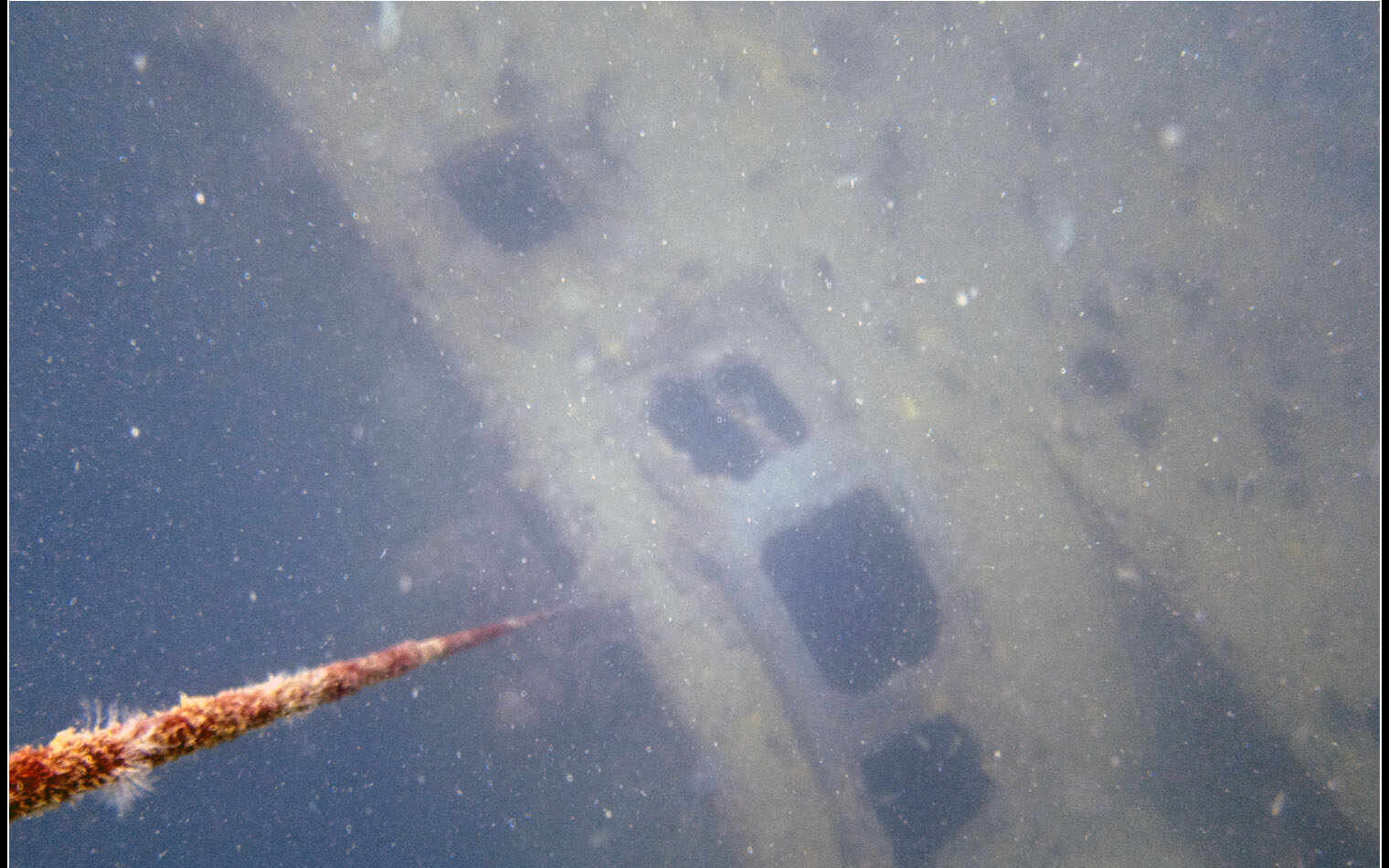 USS New York wreck Subic Bay. Descending the shot line to observe gun turrets in the hull.
