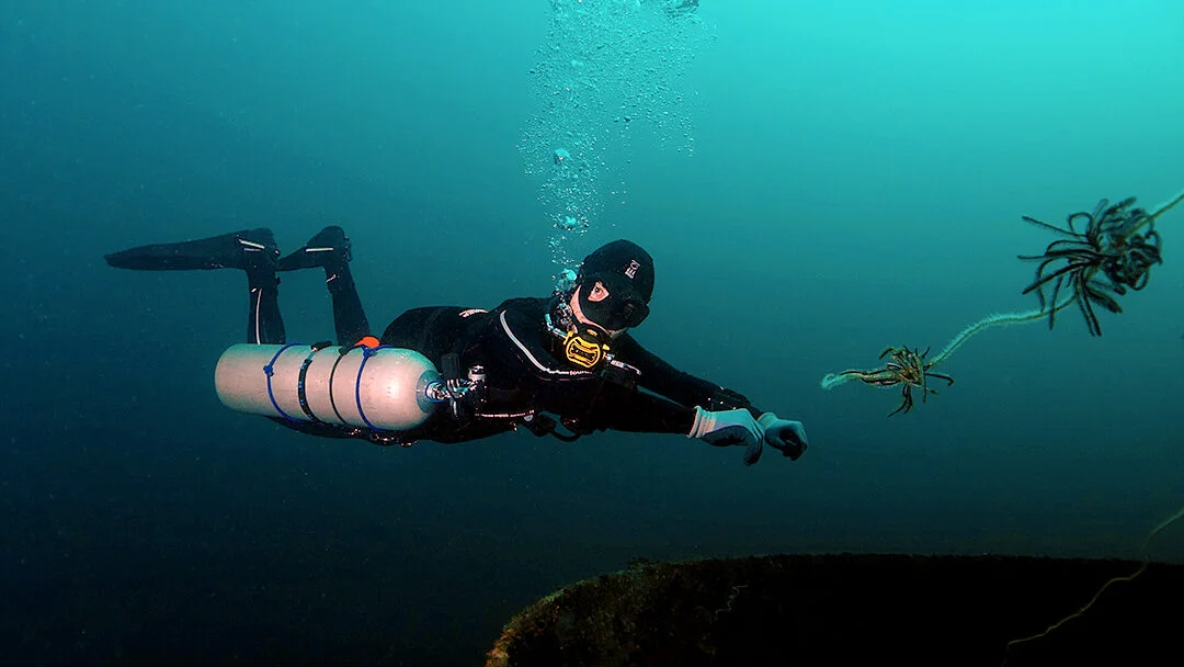 diving student on a certification course in subic bay with andy davis